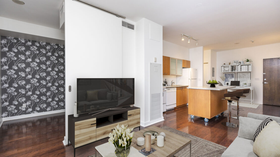 Cozy living room with hardwood floors in Ottawa condo