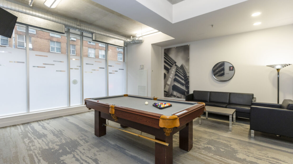 Lounge area with pool table in Ottawa condo