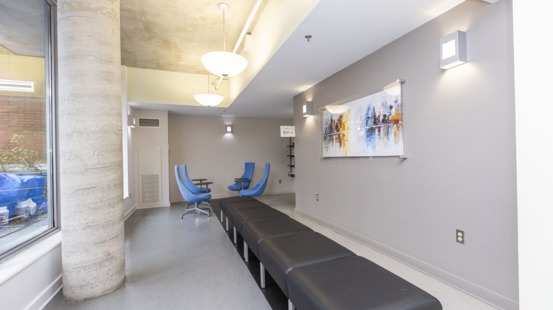 Modern condo meeting room with seating and table in Byward Market