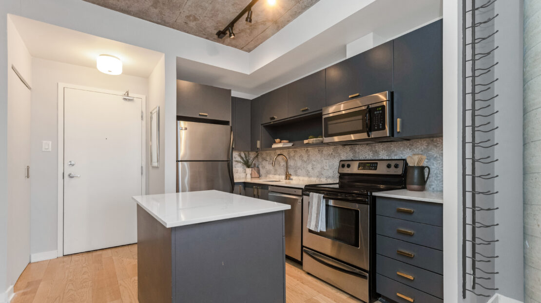 Renovated kitchen with quartz countertops