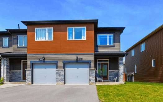 End-unit townhouse at 33 Damselfish Walk with private yard and modern interior